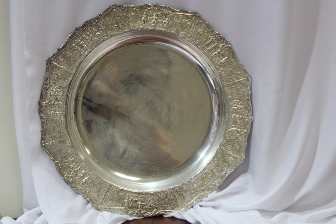 A Carved Silverplated Tray: well carved - 14 1/2" in diameter