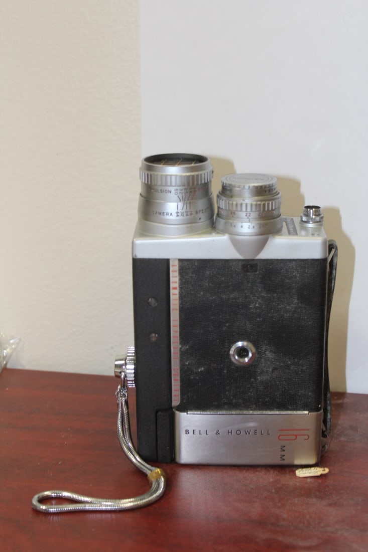 A Vintage Bell and Howell Camera: 16mm- 200ee camera - do not know if it works, nor how to work it - what you see is what you get
