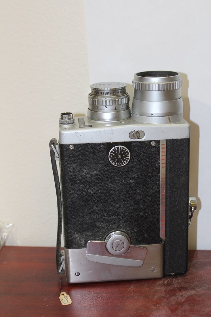 A Vintage Bell and Howell Camera - 5