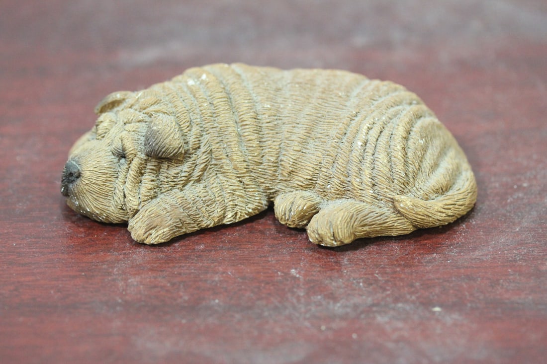 A Composite Material Sandicast Dog: signed - 3 5/8" long