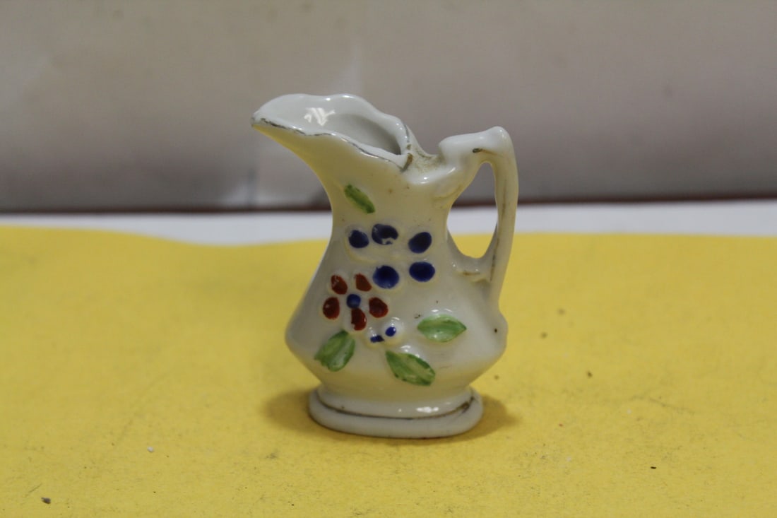 A Small Occupied Japan Pitcher: 2 1/2" tall