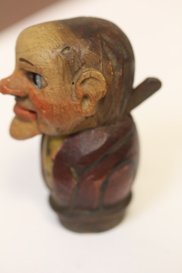 A Carved Wooden Stopper - 2
