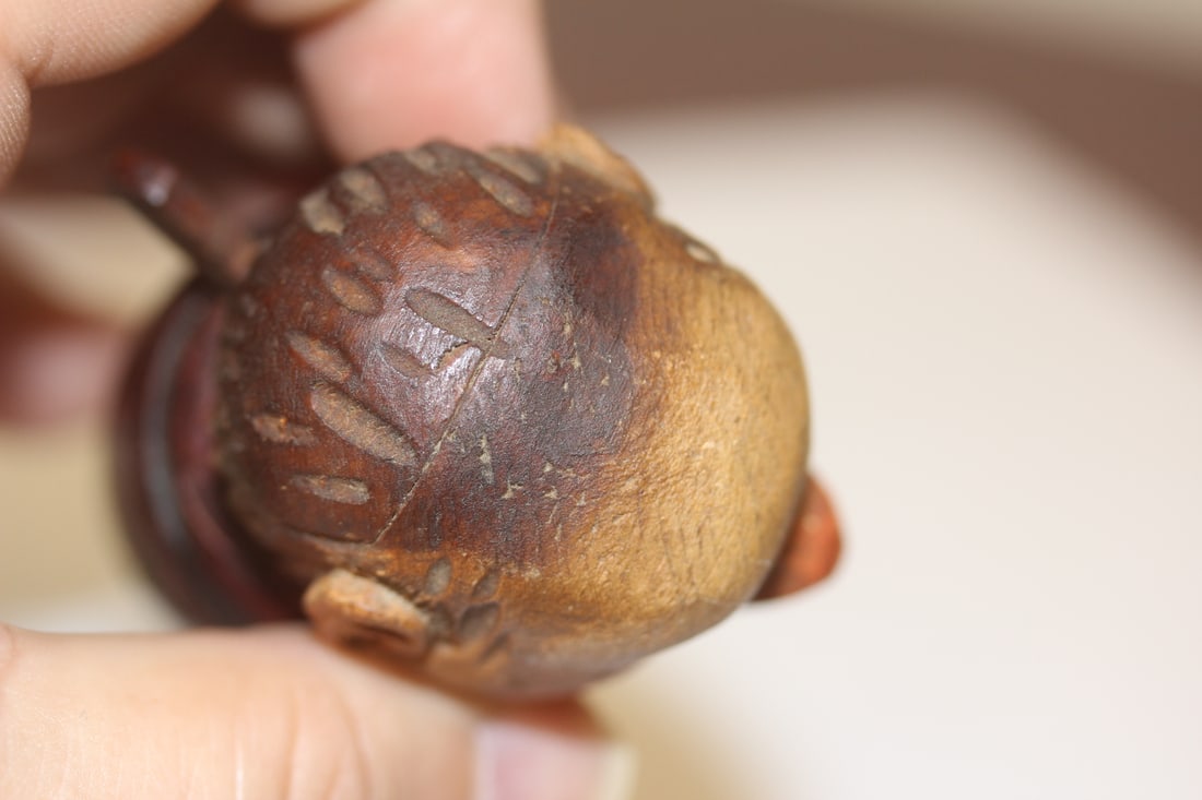 A Carved Wooden Stopper - 6