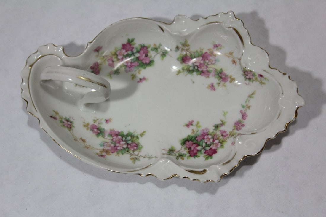 A Vintage Ceramic Container: with handle - 6 1/2" long