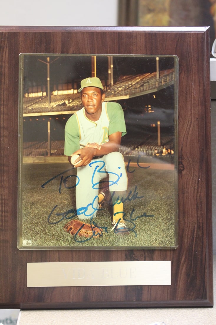 Vida Blue Autographed Photograph on Plaque: overall= 15" x 12"