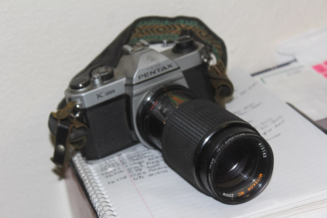 Pentax Camera with Zoom Lens: and strap - please note: not tested to see if works or not