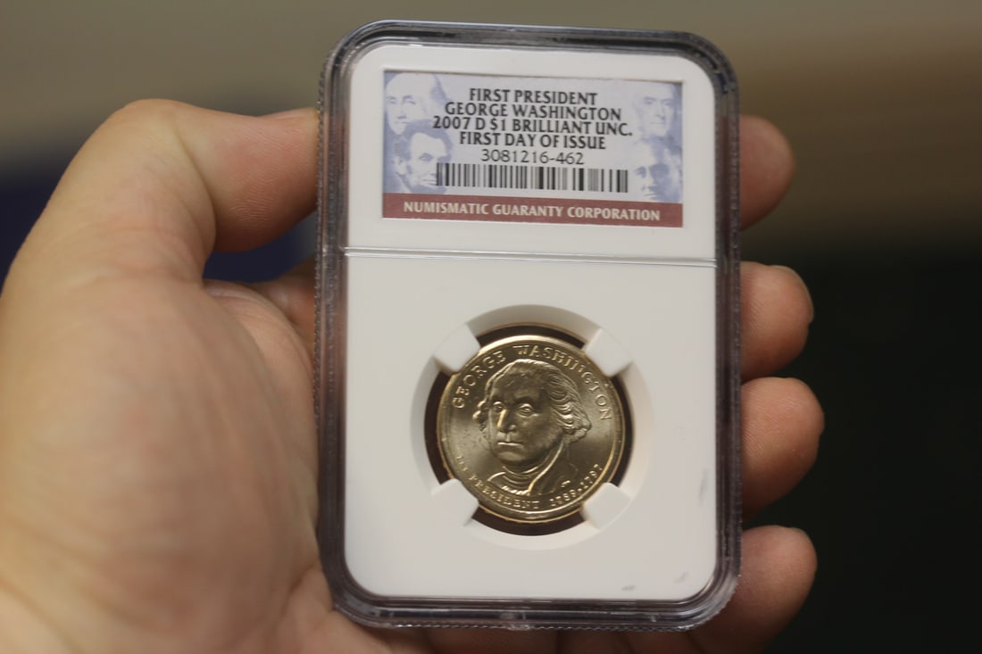 NGC Graded One Dollar Gold Plated Coin: as shown