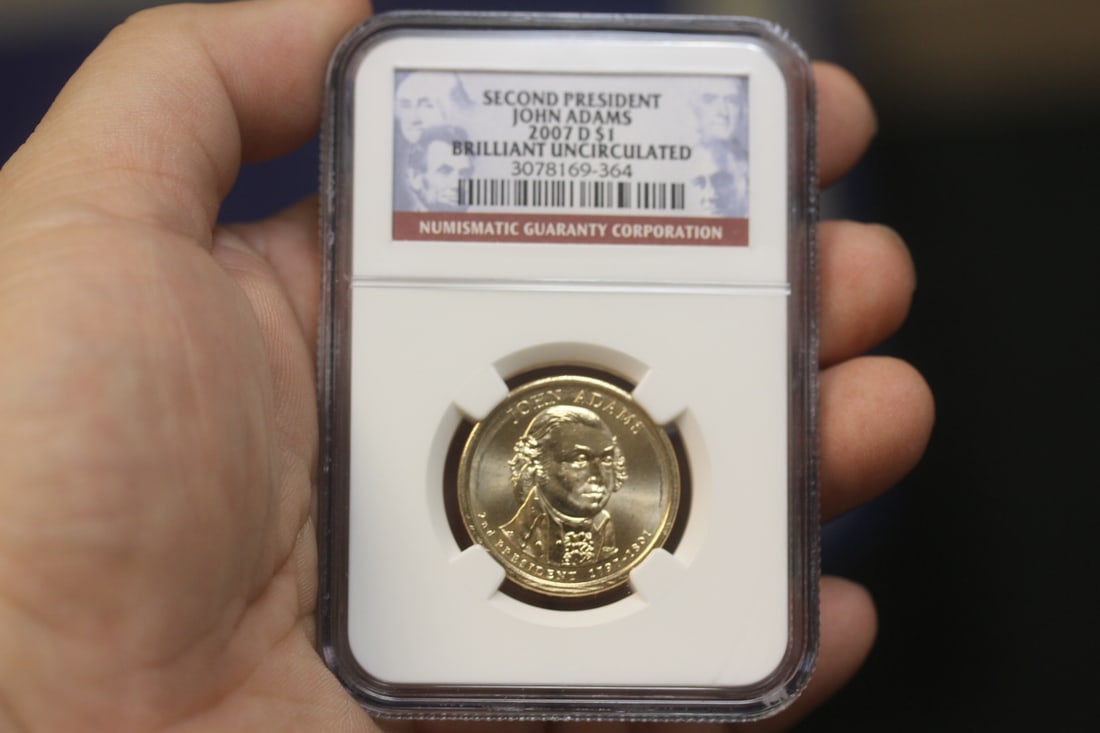 NGC Graded One Dollar Gold Plated Coin: as shown