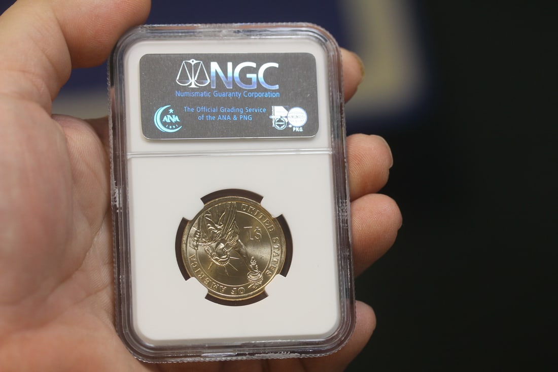 NGC Graded One Dollar Gold Plated Coin - 2