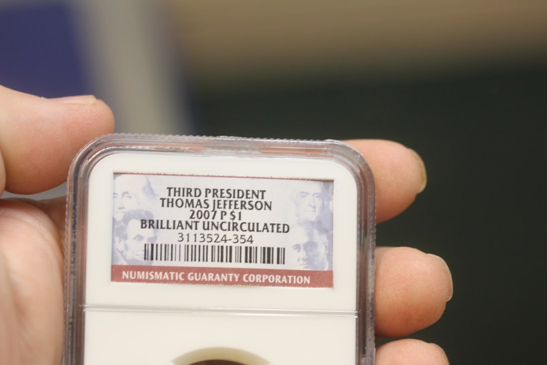 NGC Graded One Dollar Gold Plated Coin - 3