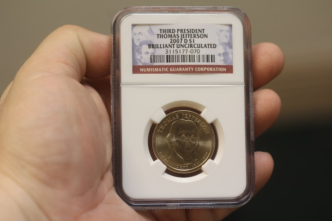 NGC Graded One Dollar Gold Plated Coin: as shown