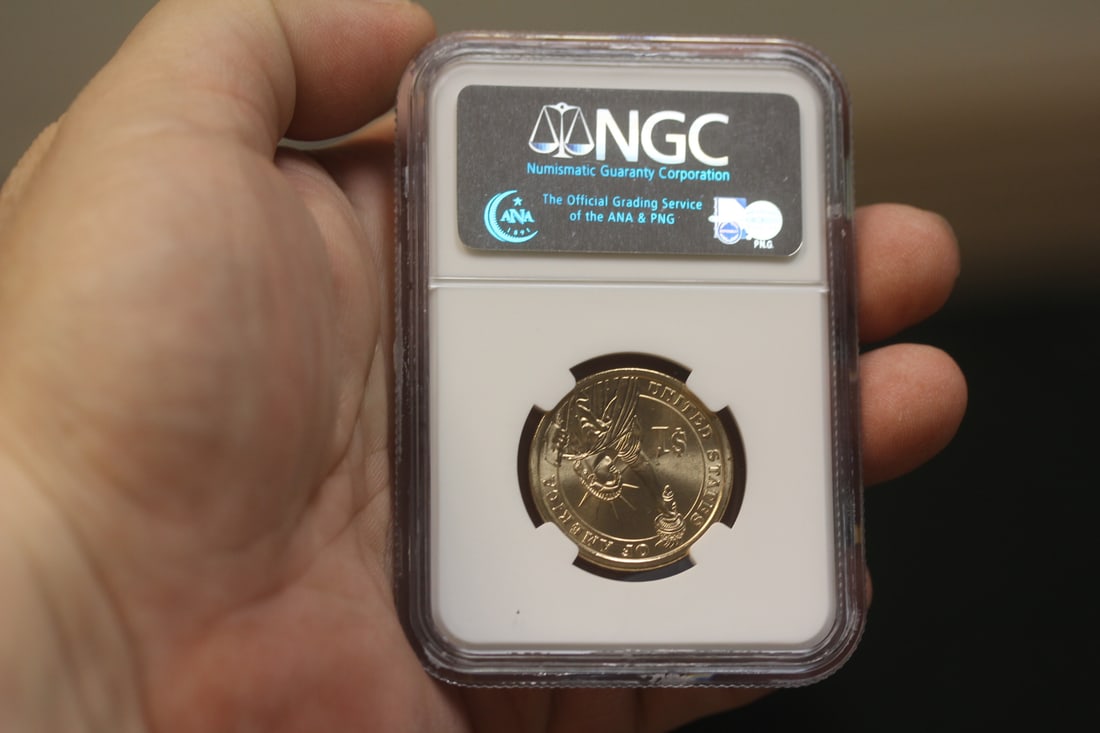 NGC Graded One Dollar Gold Plated Coin - 2