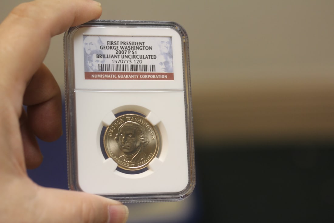 NGC Graded One Dollar Gold Plated Coin: as shown