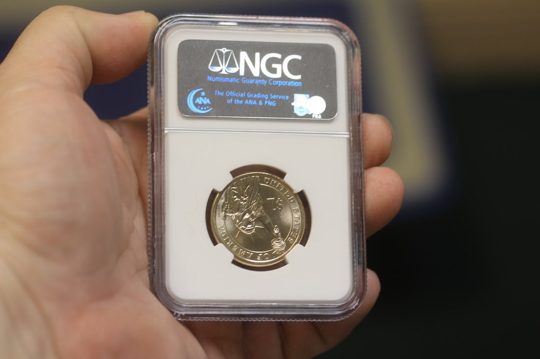 NGC Graded One Dollar Gold Plated Coin - 2