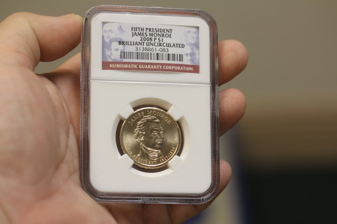 NGC Graded One Dollar Gold Plated Coin: as shown