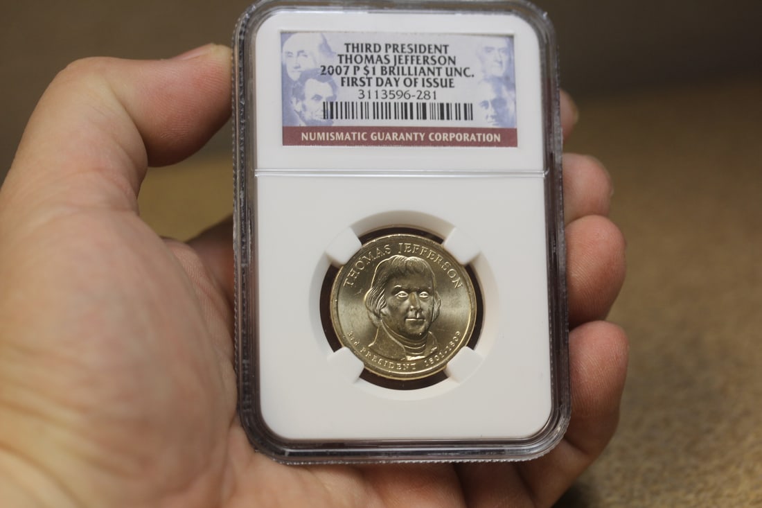 NGC Graded One Dollar Gold Plated Coin: as shown
