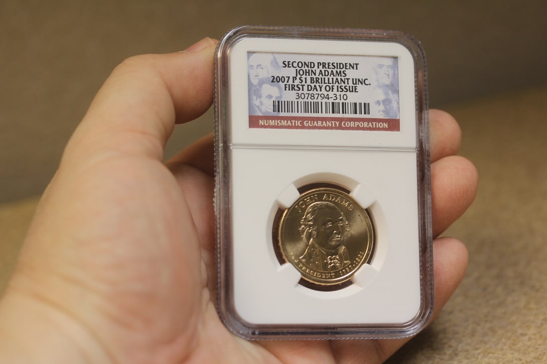 NGC Graded One Dollar Gold Plated Coin: as shown