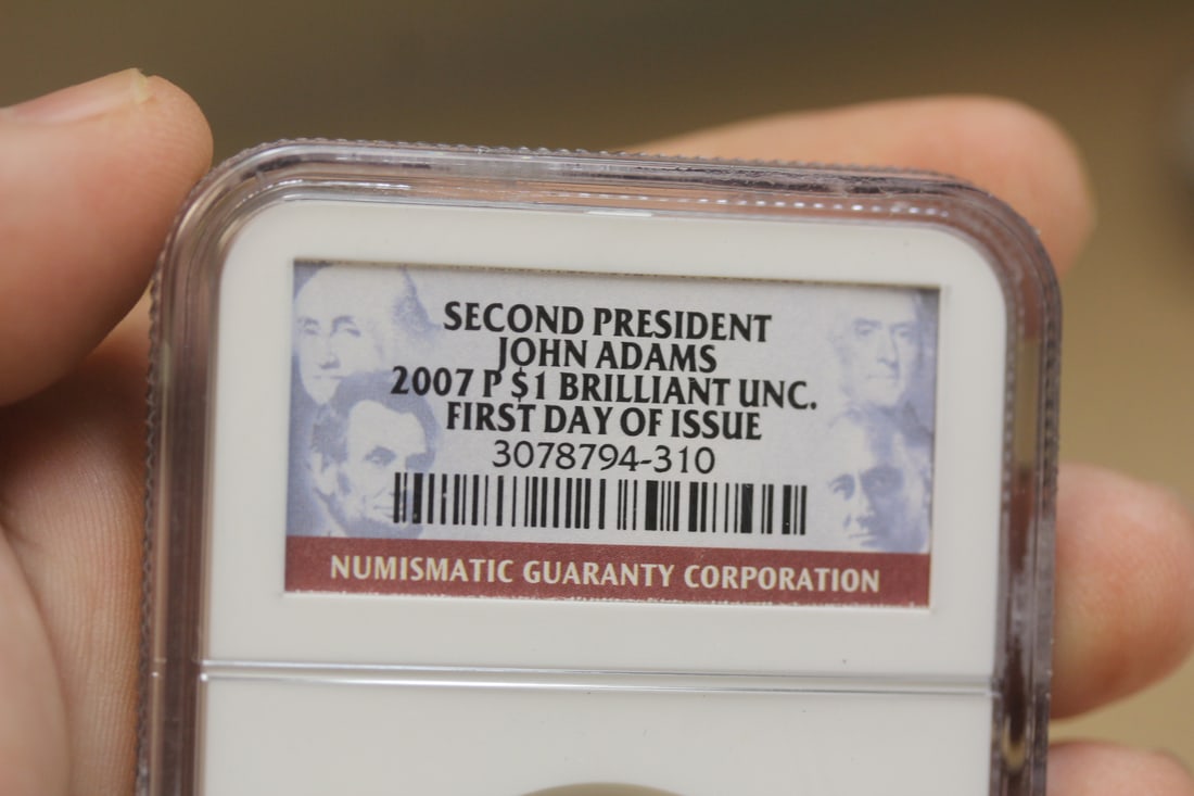 NGC Graded One Dollar Gold Plated Coin - 3