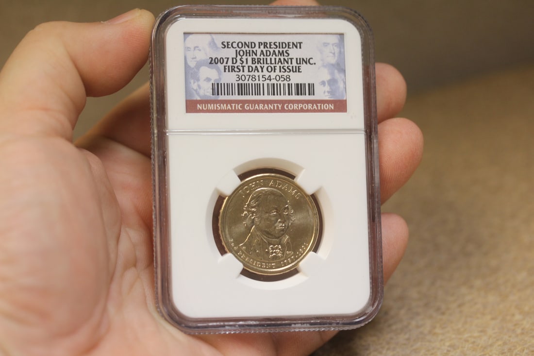 NGC Graded One Dollar Gold Plated Coin: as shown