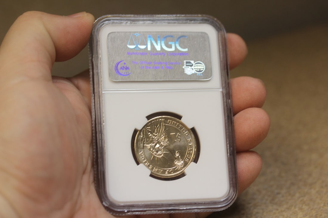 NGC Graded One Dollar Gold Plated Coin - 2