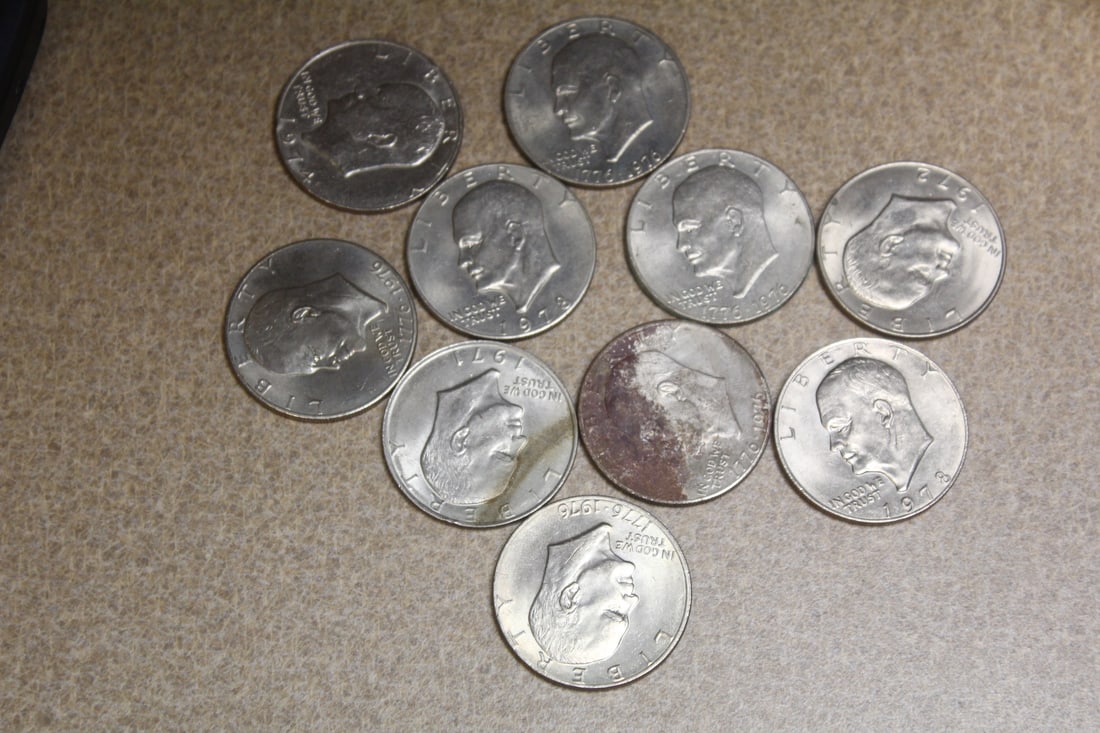 Lot of 10 Clad Ike Dollars: as shown