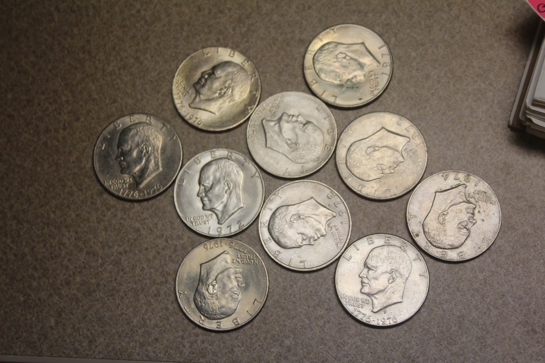 Lot of 10 Clad Ike Dollars: as shown