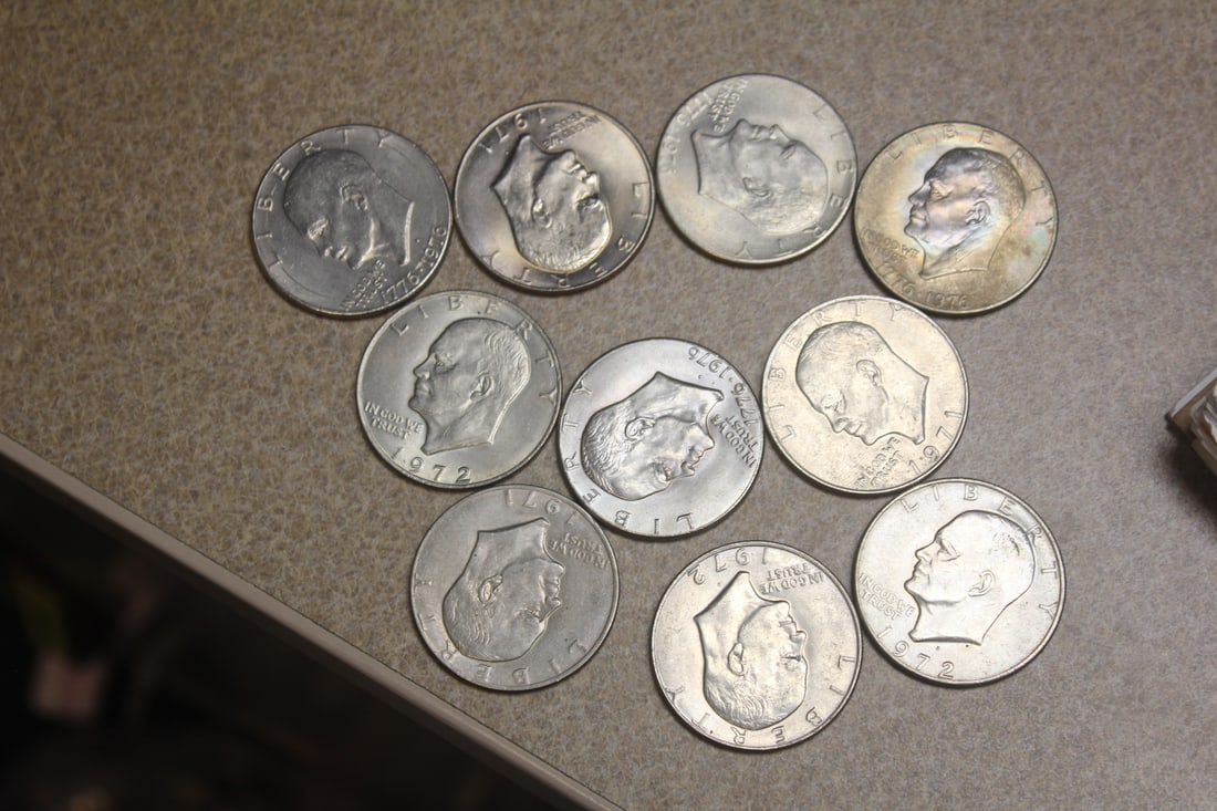 Lot of 10 Clad Ike Dollars: as shown