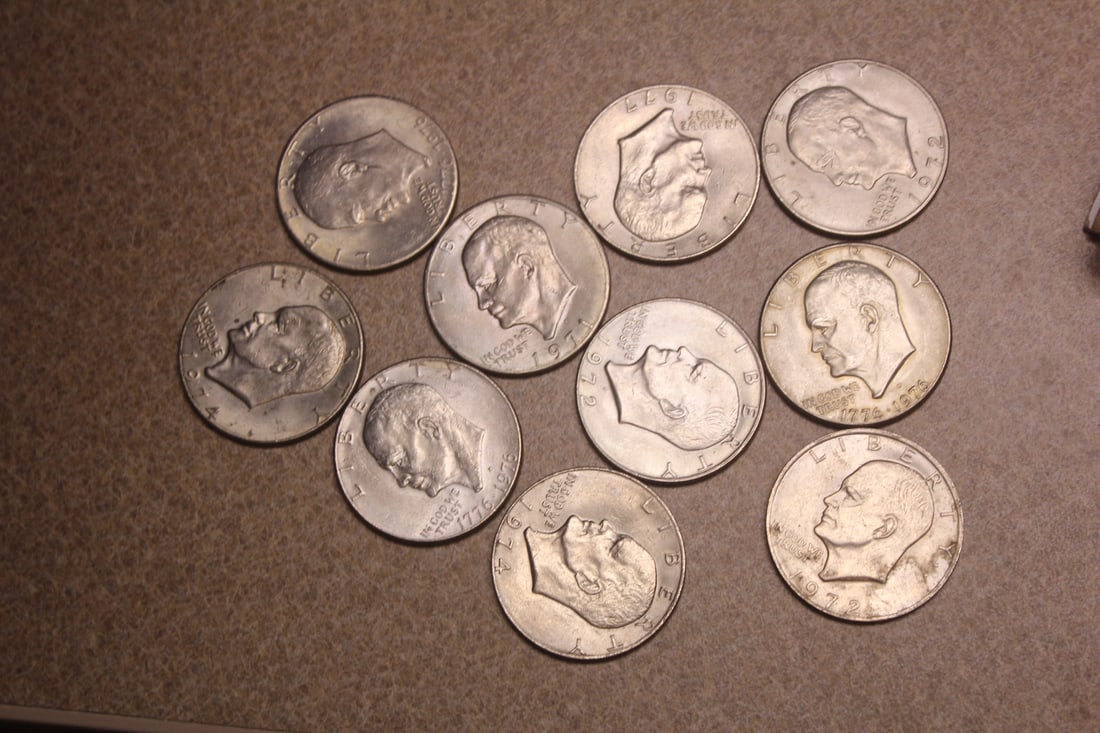 Lot of 10 Clad Ike Dollars: as shown