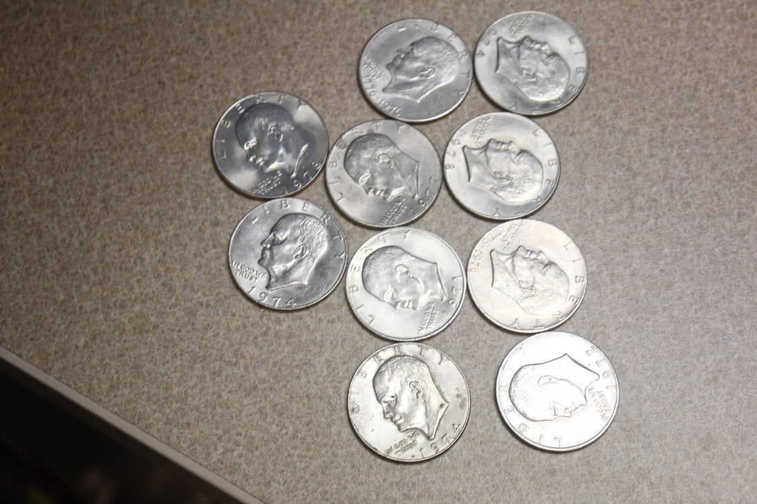 Lot of 10 Clad Ike Dollars: as shown