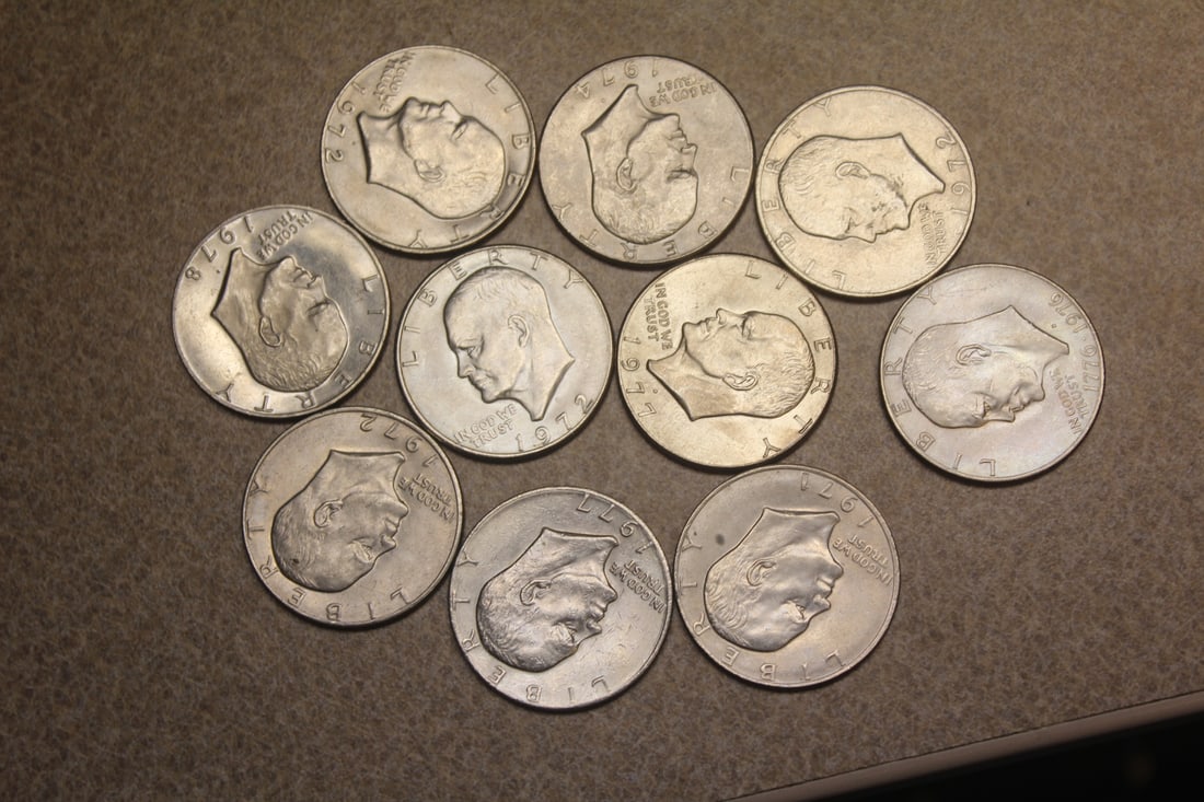 Lot of 10 Clad Ike Dollars: as shown