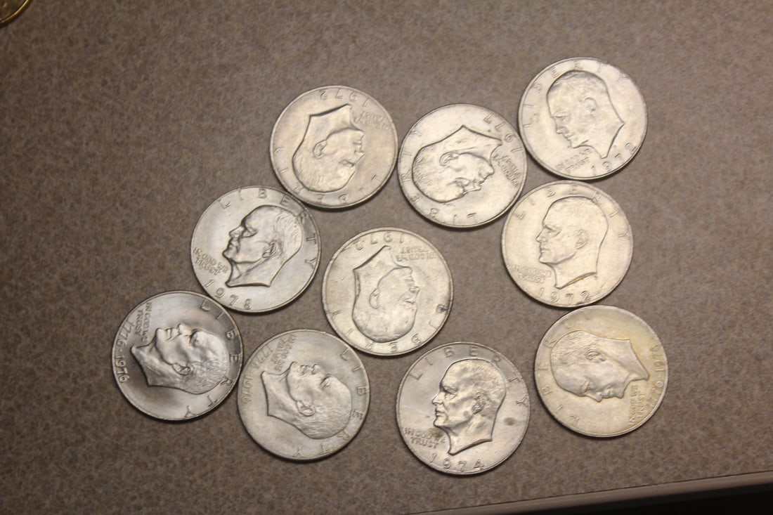 Lot of 10 Clad Ike Dollars: as shown