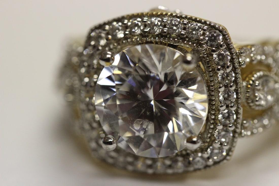 A Gold Plated on Sterling Ring with Stones - 9