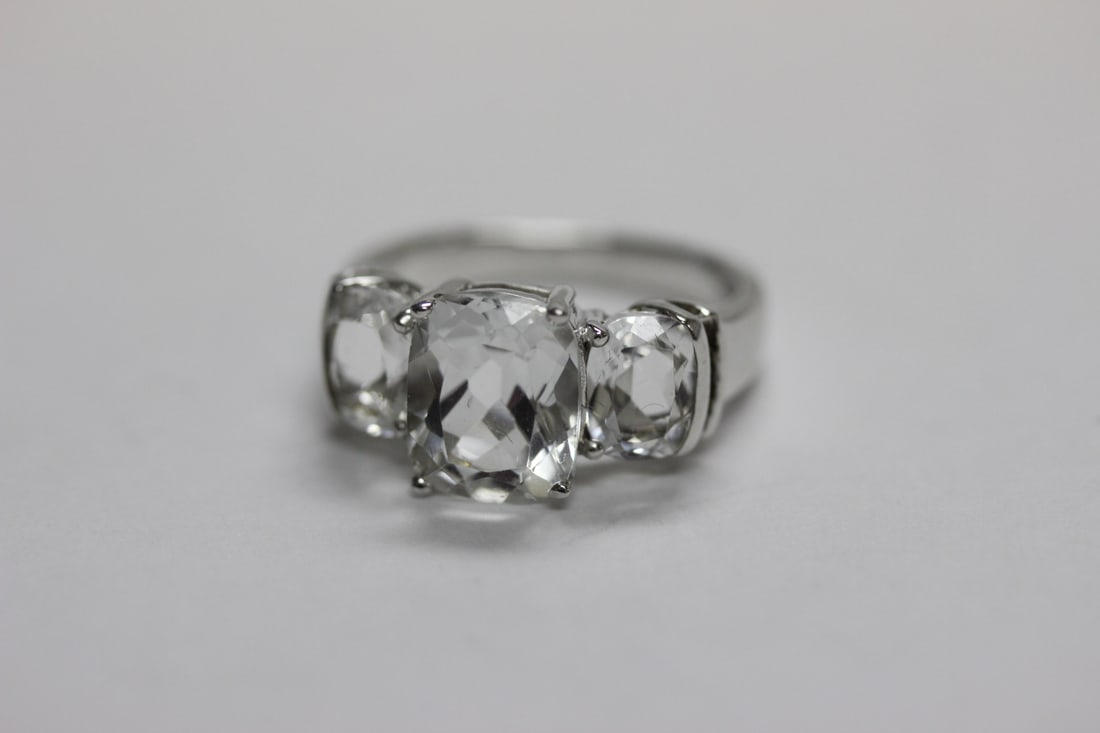 A Sterling Ring with Clear Stones - 2