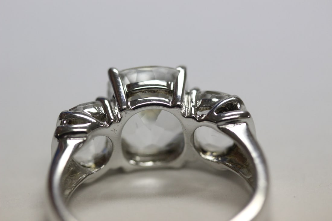 A Sterling Ring with Clear Stones - 8