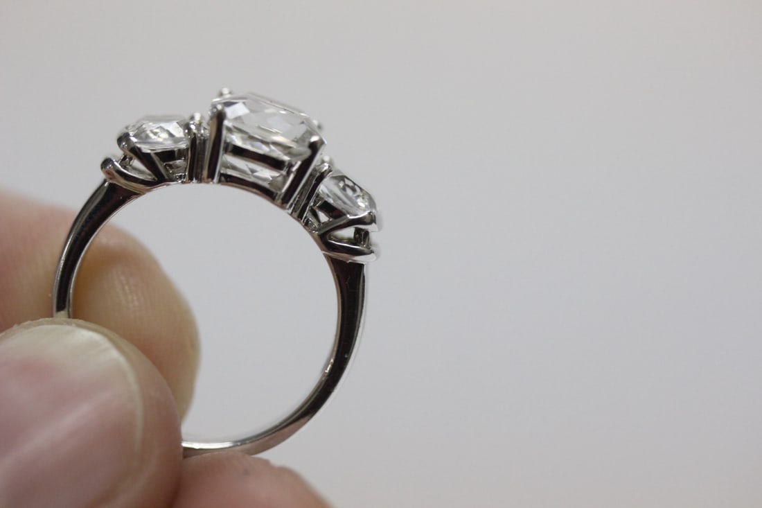 A Sterling Ring with Clear Stones - 9
