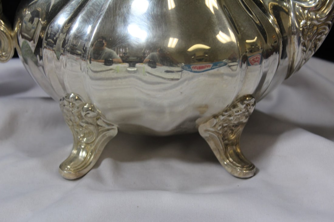 A Silverplated Teapot - 7