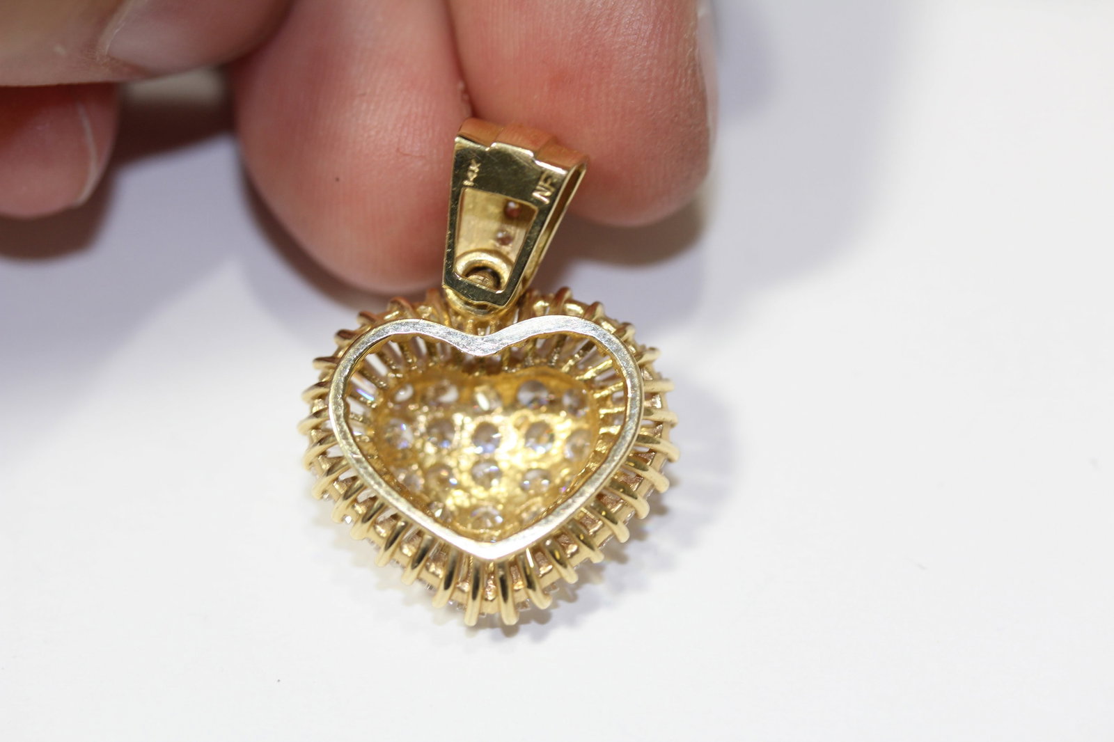 A 14KT Gold And Diamond Pendant - 7