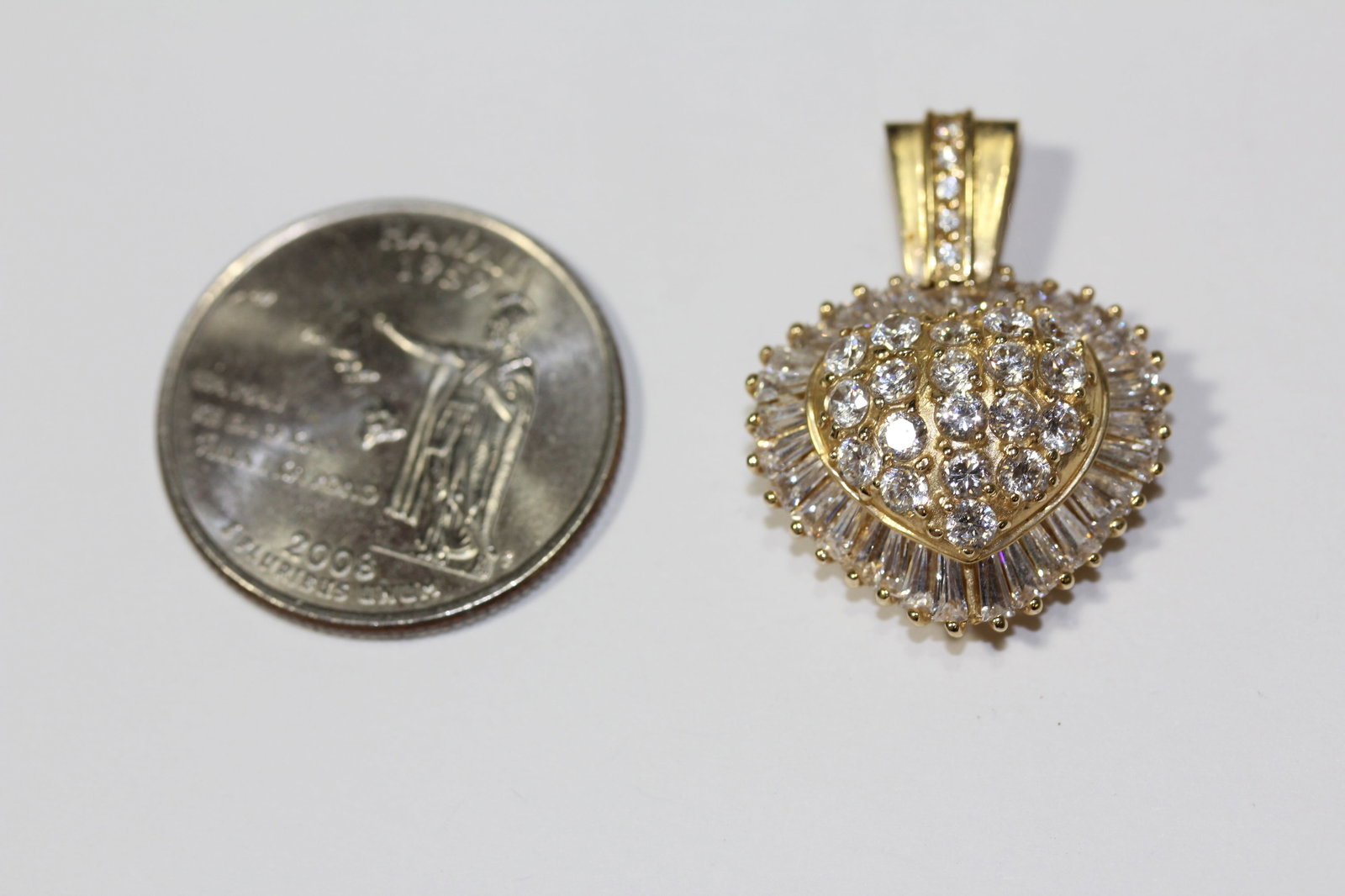 A 14KT Gold And Diamond Pendant - 8