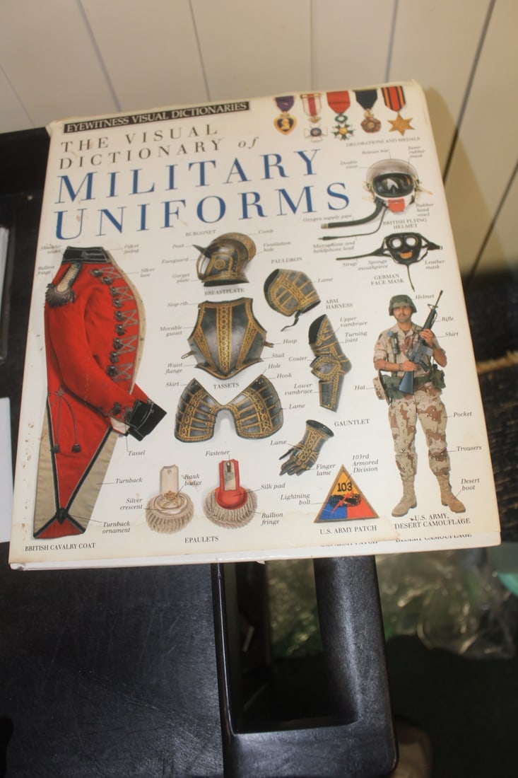 Hardcover Book on Military Uniforms: as shown