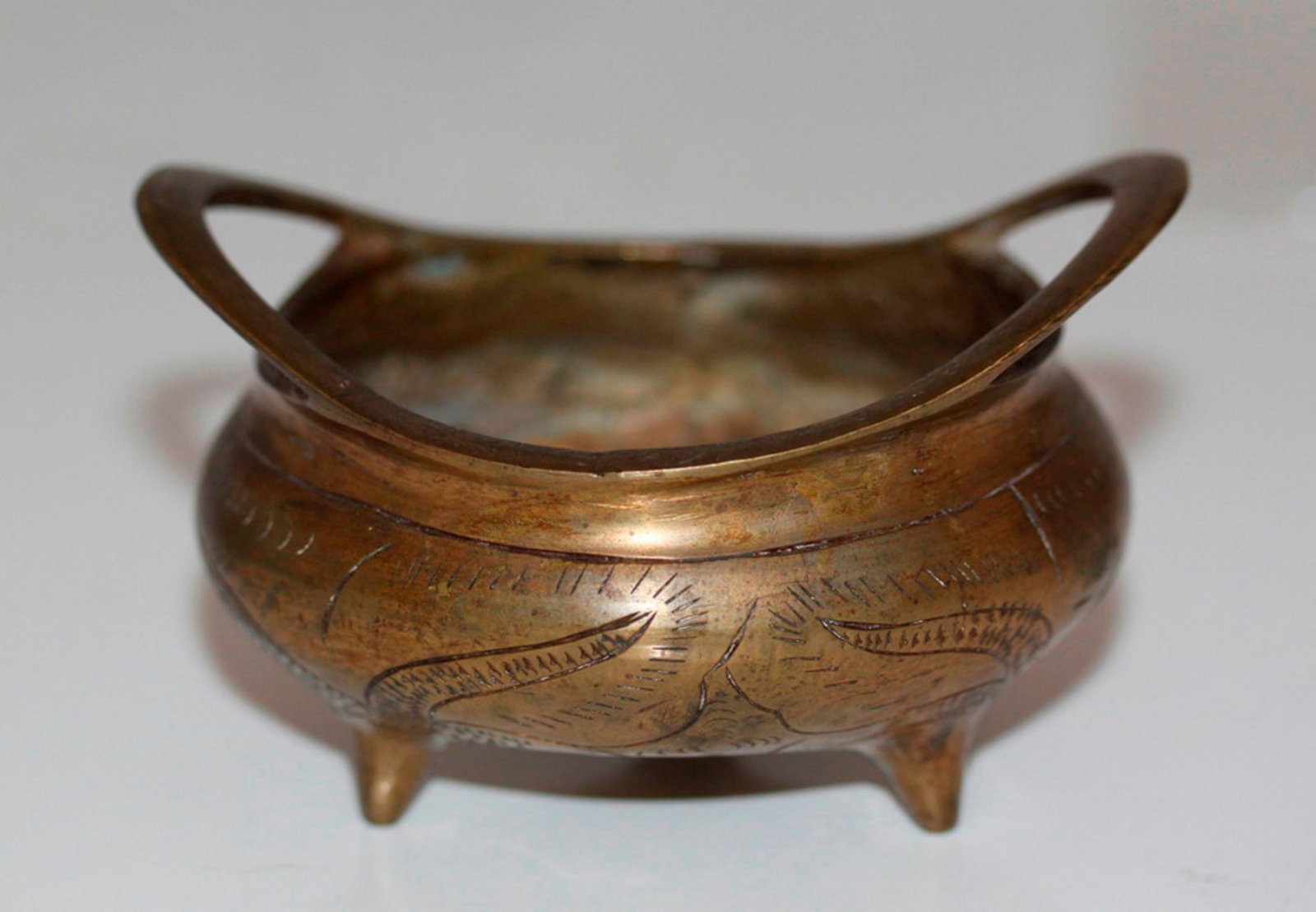 Antique Chinese Censor 19th / 20th Century: Probably bronze. Signed on the bottom. 1 3/4" tall (not including handle) x 4" at widest point.