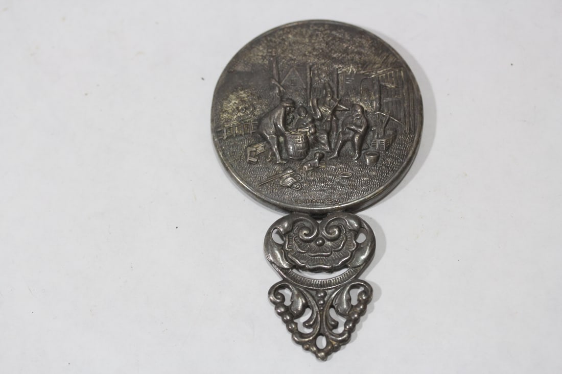 A Dutch Silverplated Repousse Mirror: for purse - 4 3/8" across