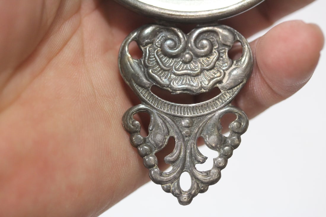 A Dutch Silverplated Repousse Mirror - 4