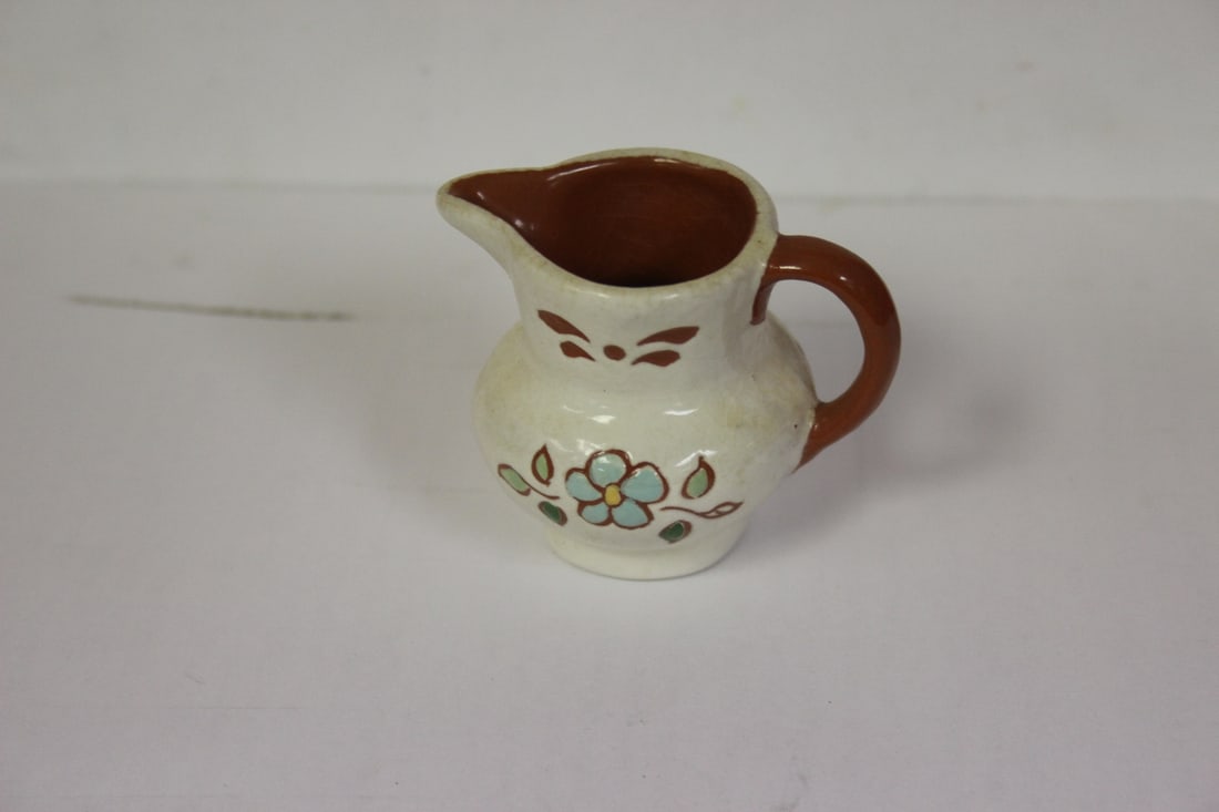 A Miniature Ceramic Pitcher: 2" tall