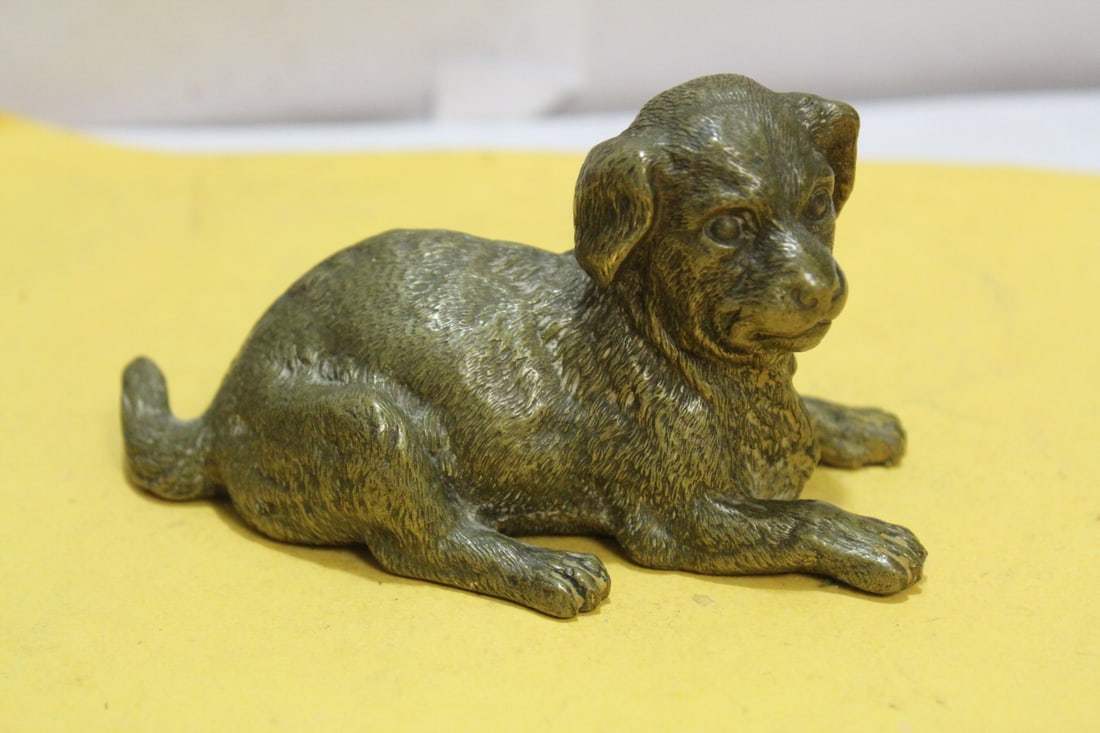 A Bronze Depose Dog: solid bronze - 4 1/8" long - rare