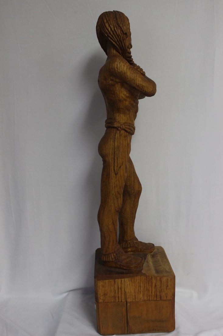A Wood Statue of a Native American Man - 2