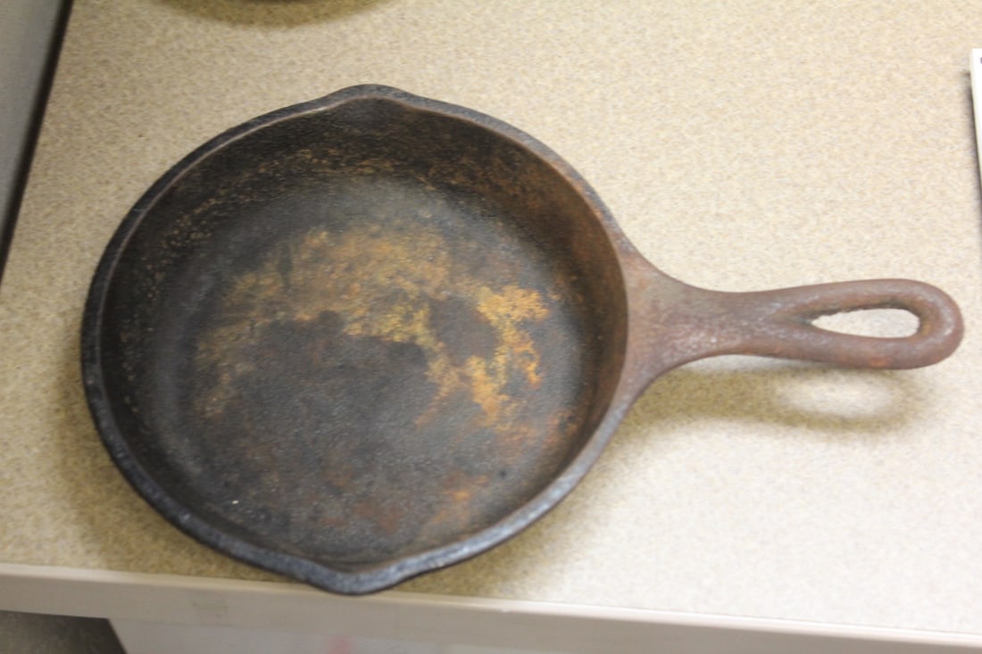 Lodge Cast Iron Pan: 6 1/2" in diameter without the spout or handles