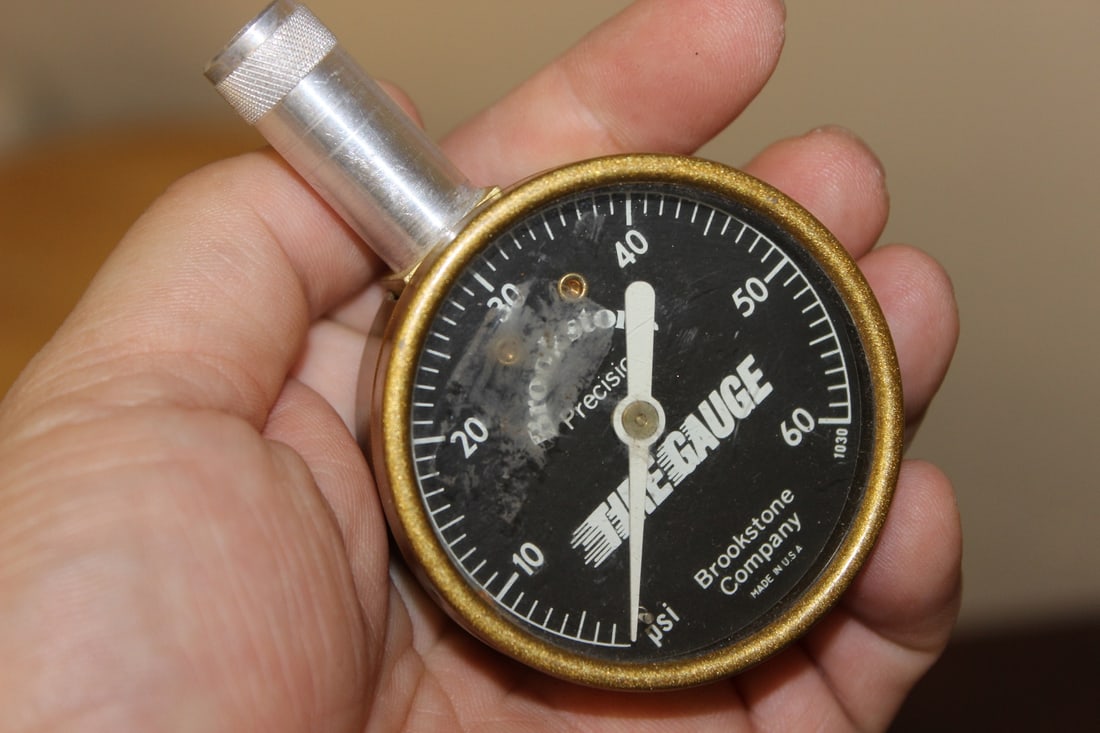 A Brookstone Company Tire Gauge - 2