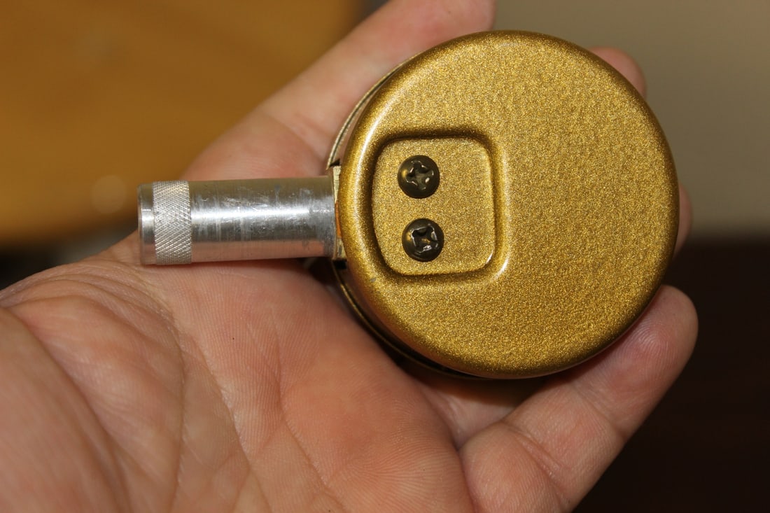 A Brookstone Company Tire Gauge - 4