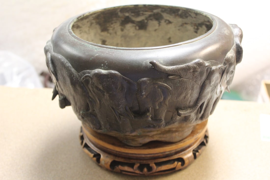 Antique Chinese/Japanese Bronze Pot: elephant motief - 19th century - please note: stand attached to the bottom via screws as shown - 7" tall overall by 9 1/2" wide