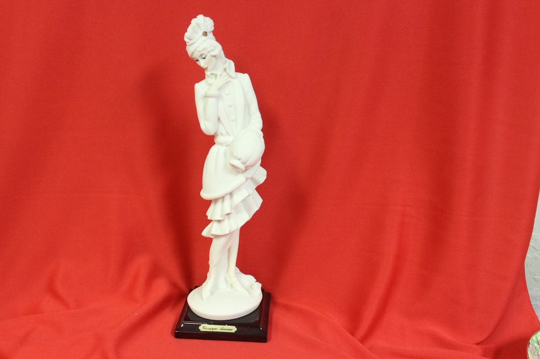 An Armani Figurine: 11 inches tall